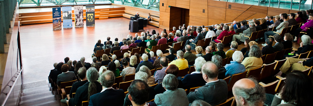 Image of an audience watching as people are given awards